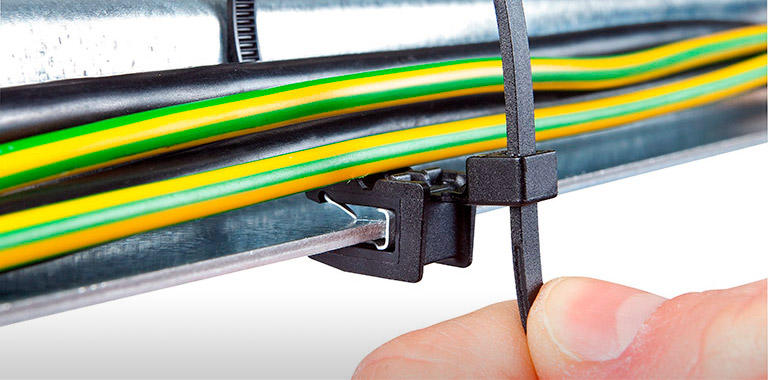 Wire routing systems for lawn, garden equipment, and toys Wire routing systems for lawn, garden equipment, and toys